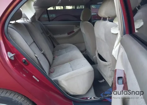 2005 Toyota Corolla Le z USA, uszkodzony, nr VIN 2T1BR30E25C452623